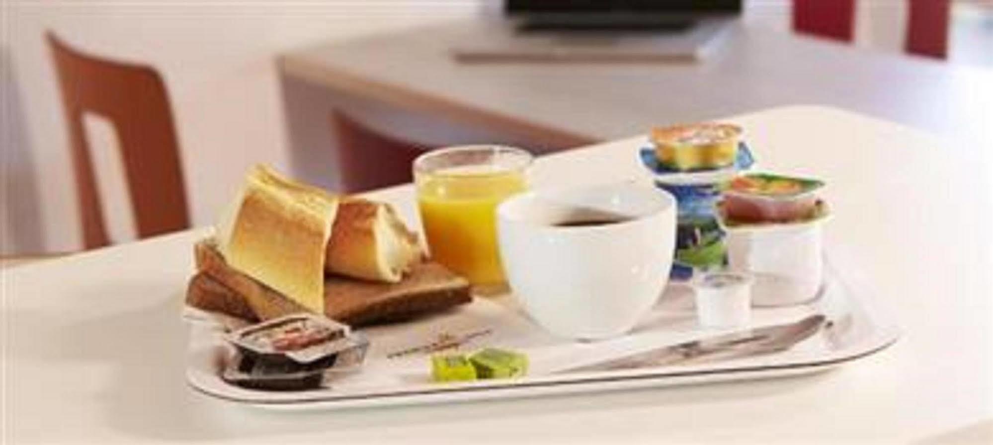 Premiere Classe Evreux Exterior photo A typical breakfast